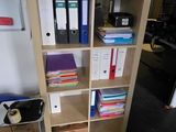 a book shelf with a bunch of books on it