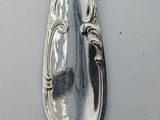a spoon that is sitting on a table