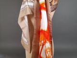 an orange and white scarf on a mannequin mannequin mannequin mannequin mannequin mannequin mannequin mannequin mann