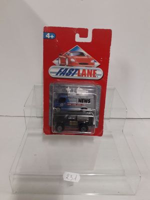 a toy truck that is in a clear box