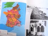 un livre ouvert sur lequel figure une carte de la France