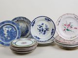 a lot of plates that are sitting on top of each other