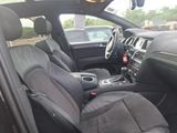the interior of a car with black seats and black trims