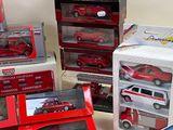 a lot of toy cars that are in the boxes