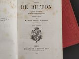 a book with a picture of a coat of arms on top of it