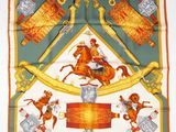 an image of a square scarf with a picture of a man riding a horse