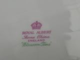 a close up of a plate with a crown on it