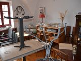 an image of a living room with a table and chairs