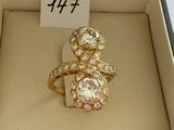a ring in a box with a price tag on it