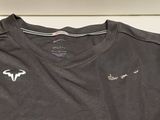 a black shirt with a white fox logo on it
