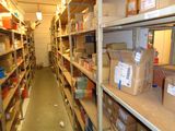 many boxes on the shelves in the room