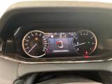 a car dashboard with a speedometer and a clock on it