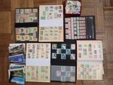 many different types of stamps on the table