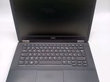 the dell laptop is open and ready to be used
