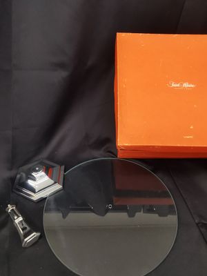 an orange box with a glass table top and a pair of scissors