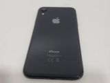the back of an iphone with the camera facing up on a white surface