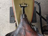 a motorcycle that has a saddle on the back of it