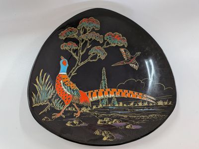 an image of a decorative plate with a pheasant on it