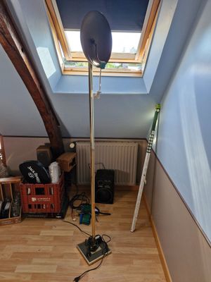 a lamp that is on the floor in a room