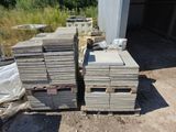 many stacks of concrete blocks stacked on top of each other