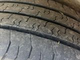 the tire of a car that is sitting on the ground