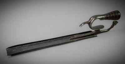a small knife that is sitting on top of a table