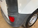 a close up of the rear end of a white truck