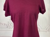 a woman ' s red top on a mannequin mannequin mannequin mannequin mannequin mannequin mannequin mannequin