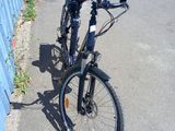 a bicycle parked on the side of the road