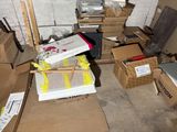 a pile of boxes and boxes on the floor in a room