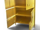 a yellow metal cabinet with a door open on a white surface
