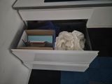 a drawer that has a lot of items inside of it