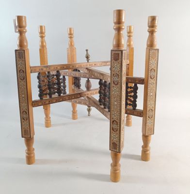 a wooden table that has a abanaclet on it