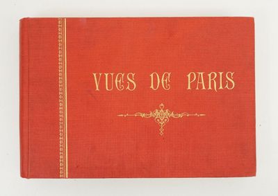 un livre rouge avec des lettres dorées sur la couverture