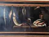 a picture of a painting of fish hanging on a line