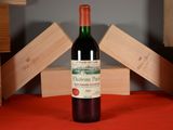 a bottle of wine that is sitting on a table