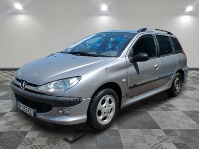 a picture of a silver car parked in a garage