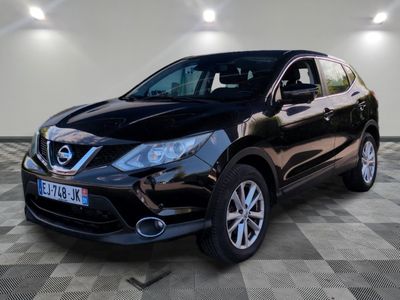 a black nissan qx - v parked in a garage