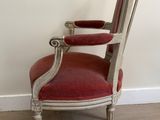 an old chair with red upholstered upholstered upholstered upholstered upholstered upholstered upholstered upholstered upholstered