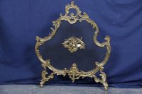 Écran de cheminée de style Louis XV en bronze ou régule doré…