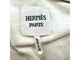 a label on a white shirt that says hermes ' s paris