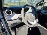 a view of the inside of a car from the driver ' s seat
