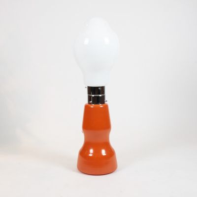 a light bulb that is sitting on top of a table