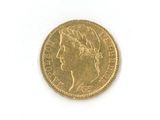 l'image d'une pièce d'or sur laquelle figure le visage d'une femme