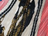 a close up of a piece of fabric with a horse on it