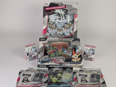 une boîte de cartes à collectionner Pokémon posée sur une table