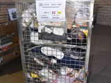 a metal cart with a lot of trash inside of it