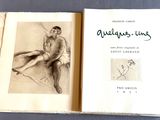 un livre sur lequel figure le dessin d'un homme assis sur une chaise