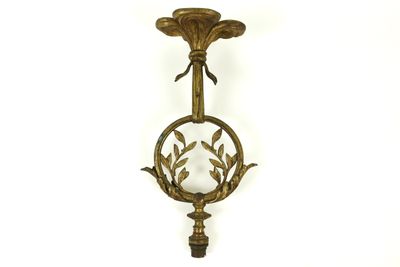 antique brass wall sconce with a bird on a branch