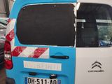 a blue and white van with a red and white stripe on it